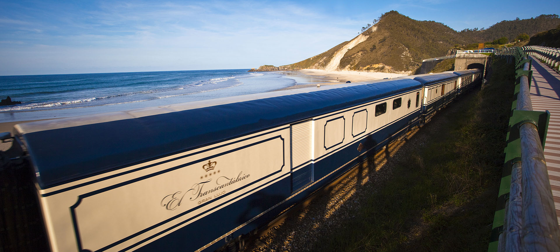 Transcantábrico Train in San Antolín beach, Asturias