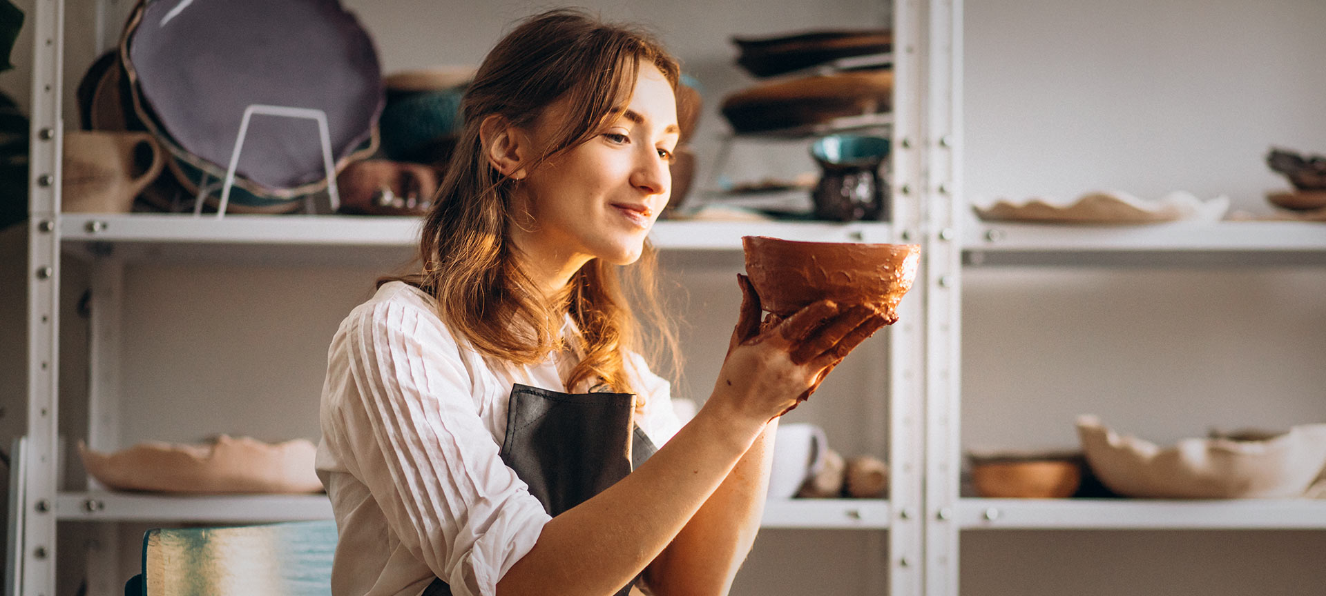 Artisan working in her workshop. Artisan working in her workshop.