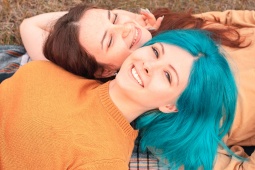Two girls celebrating Rural Pride in a natural setting in Spain