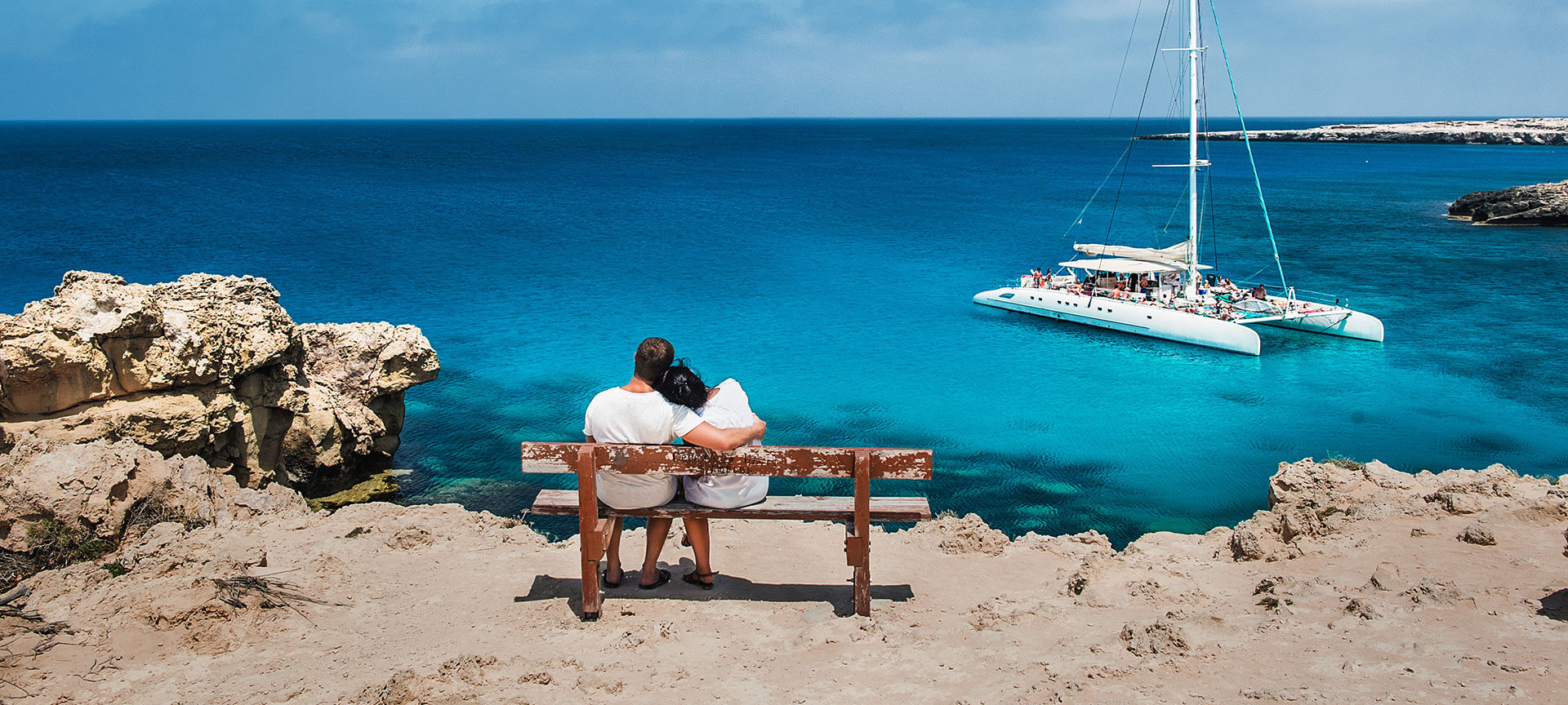 Couple gazing at the sea in the Balearic Islands