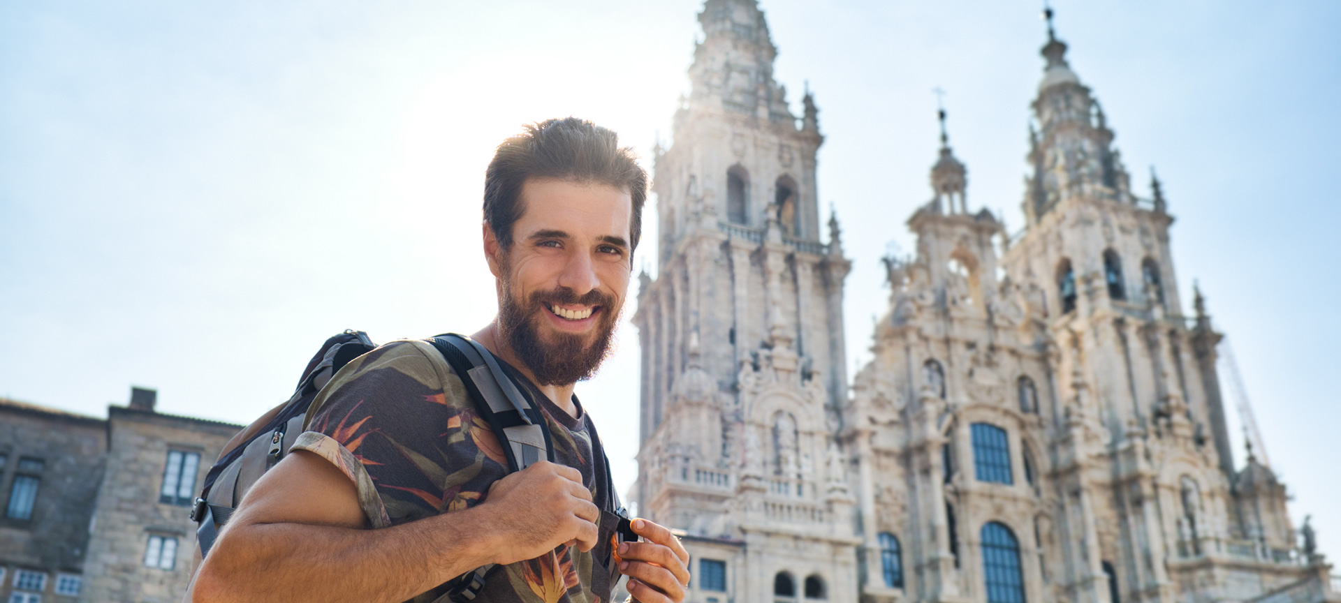 Pilgrim before the cathedral of Santiago de Compostela
