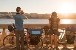 Tourists looking at the sea from the promenade of A Coruna, Galicia