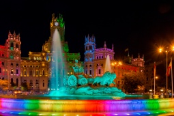 Plaza Cibeles lit up for Madrid Pride (MADO), region of Madrid