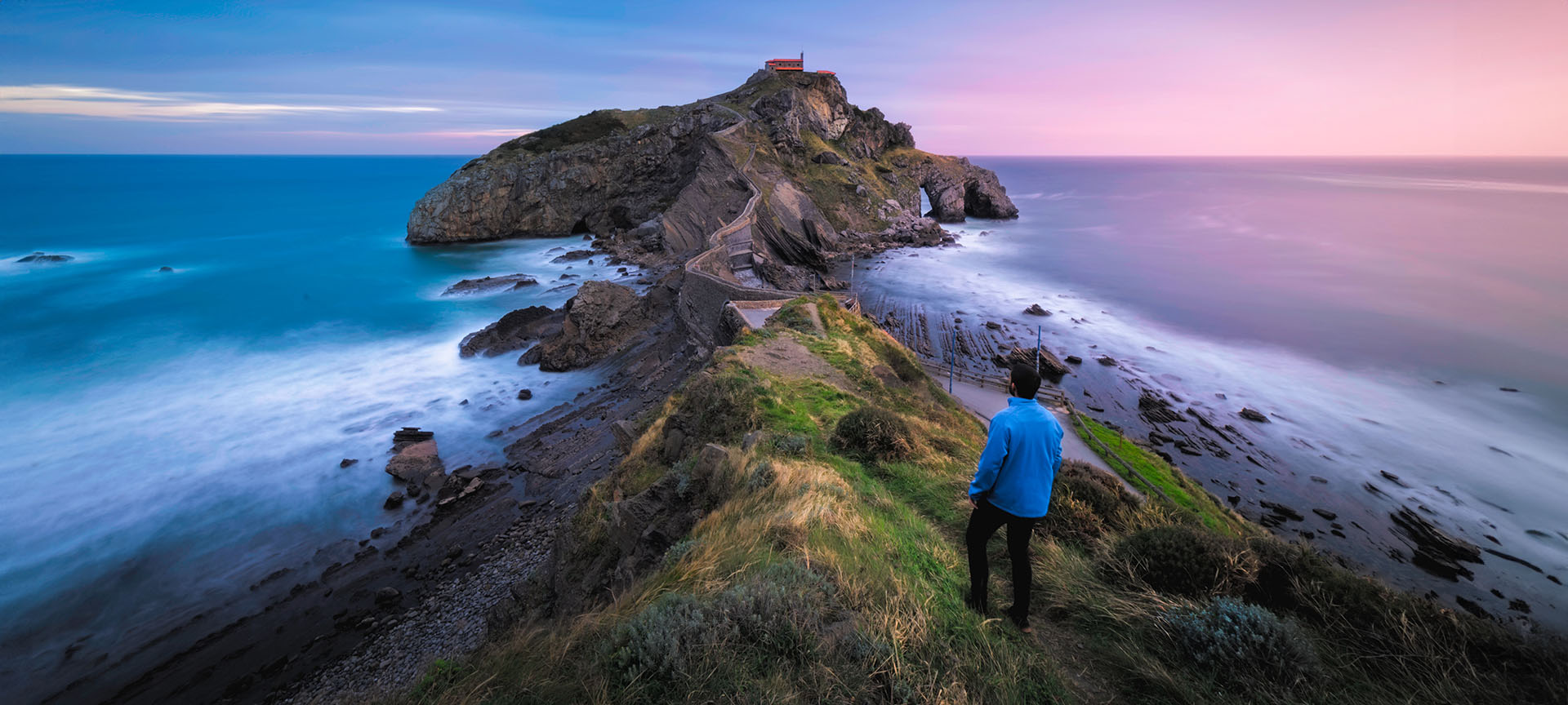 Tourist in San Juan Gaztelugatxe, Basque Country