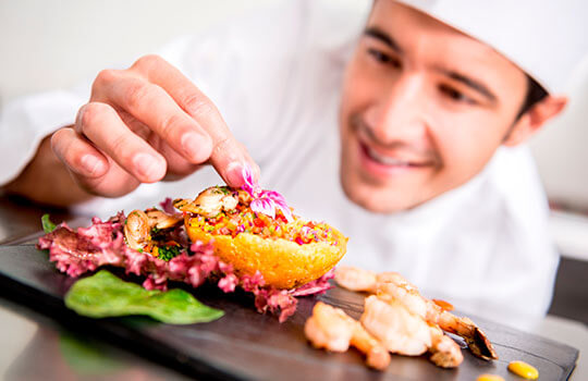 Chef plating food