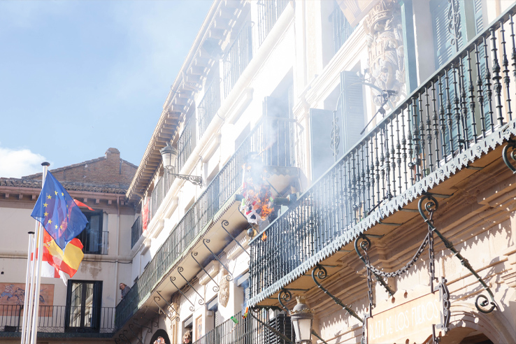Procession of the burning of the Volatin, a wood and cloth dummy with a real firecracker in its mouth Procession of the burning of the Volatin, a wood and cloth dummy with a real firecracker in its mouth