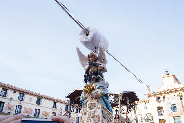 A little girl plays the central role in the Descent of the Angel, lowered to remove the black mourning veil from the image of the Virgin A little girl plays the central role in the Descent of the Angel, lowered to remove the black mourning veil from the image of the Virgin