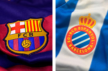 Crests of FC Barcelona and Real Club Deportivo Español