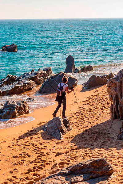Ausflügler in Platja d'Aro. Costa Brava, Girona