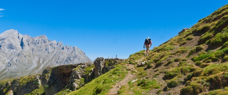 Tourist in the Camaleño valley, in Cantabria's Picos de Europa National Park Tourist in the Camaleño valley, in Cantabria's Picos de Europa National Park