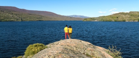 Tourists gazing at Lake Sanabria in Zamora, Castile and Leon Tourists gazing at Lake Sanabria in Zamora, Castile and Leon