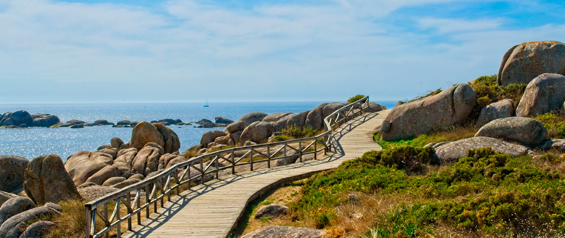 View of the wooden footbridge that runs along the San Vicente do Mar maritime path, O Grove.