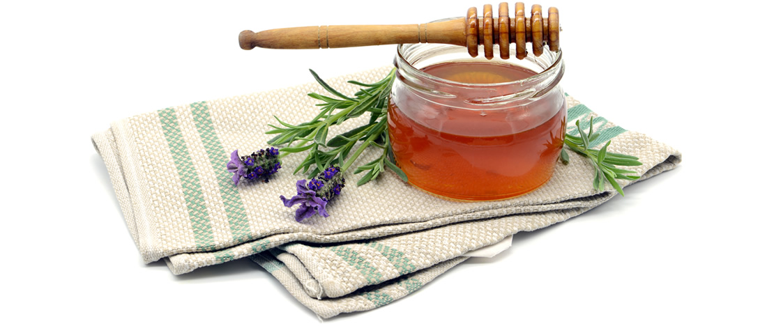 Honey jar with lavender flowers
