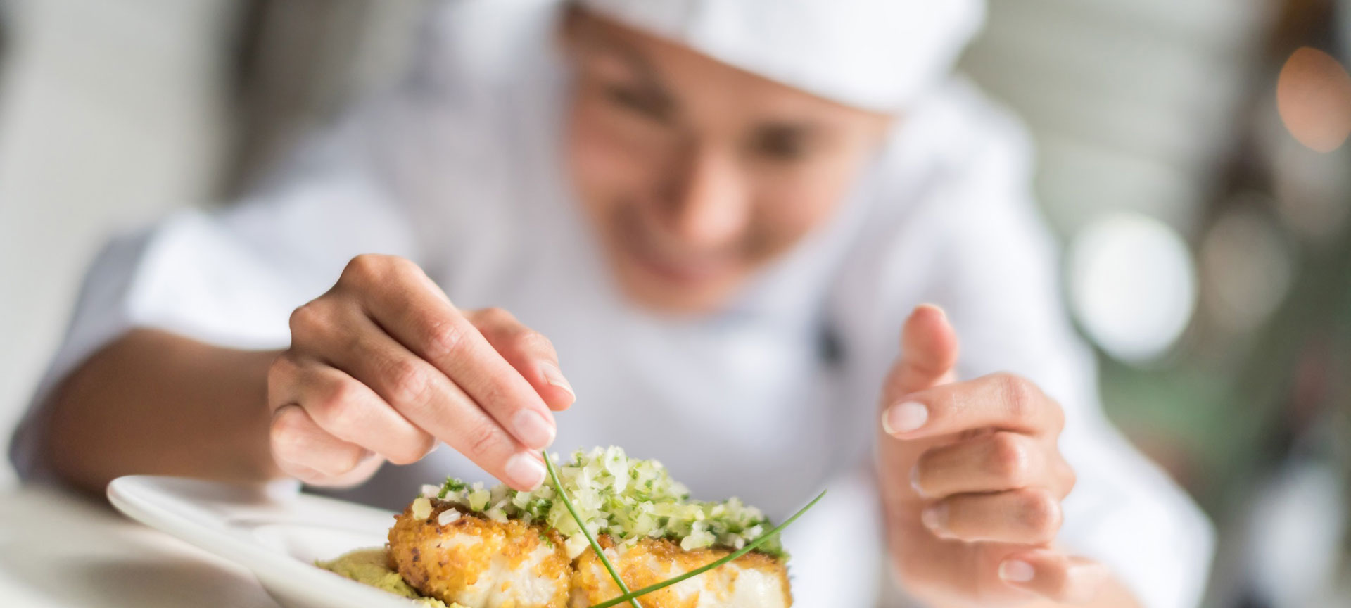 Chef plating food